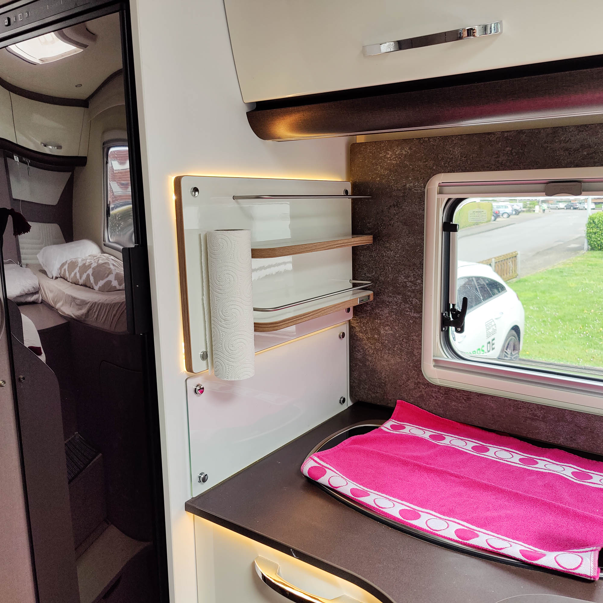 Meer opbergruimte met plank in plaats van capsulehouder