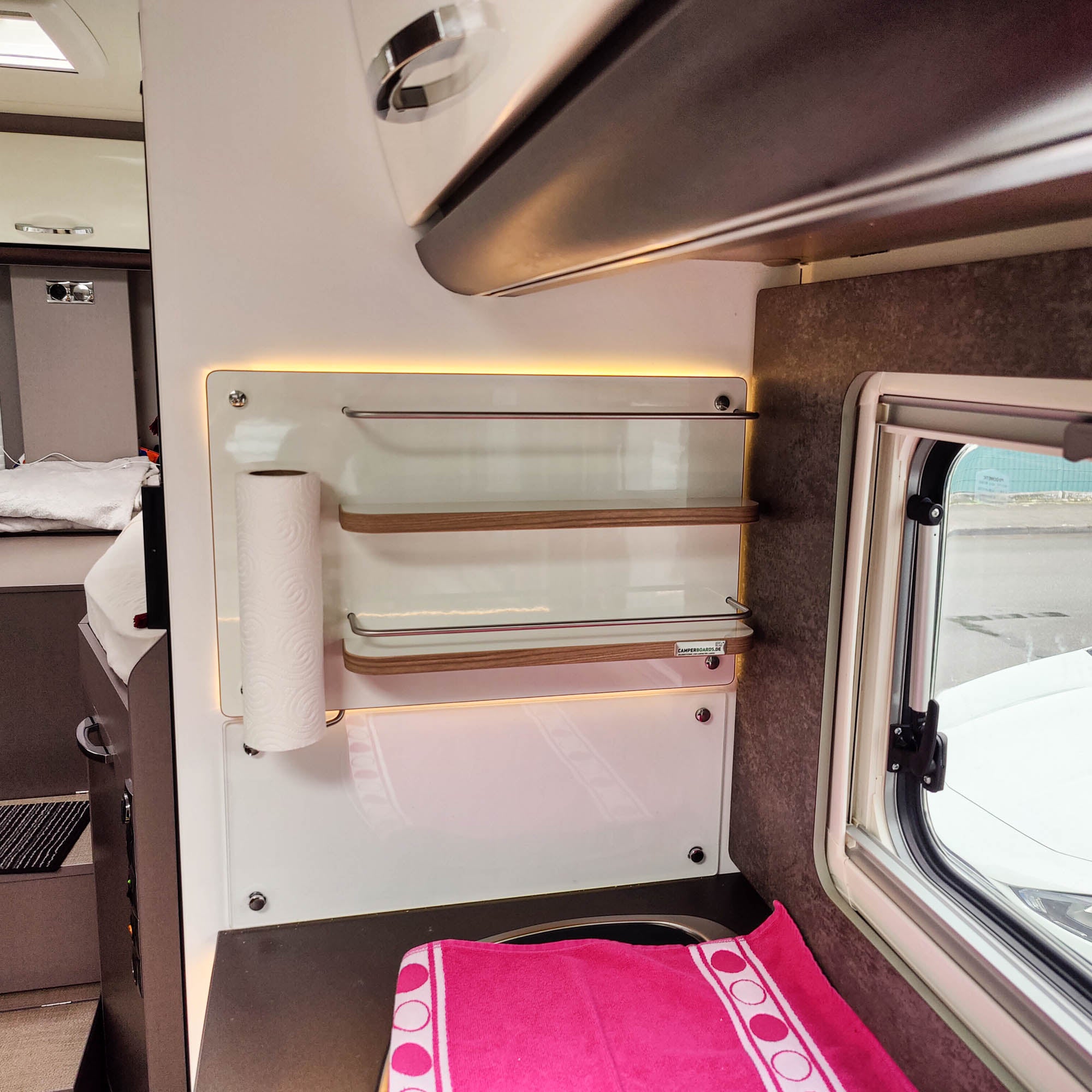 Planchet in plaats van capsulehouder met keukenrolhouder